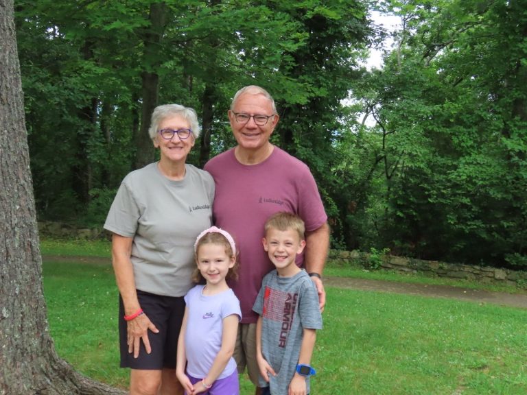 Grandparents with their two grandchildren at Lutheridge Grands Camp
