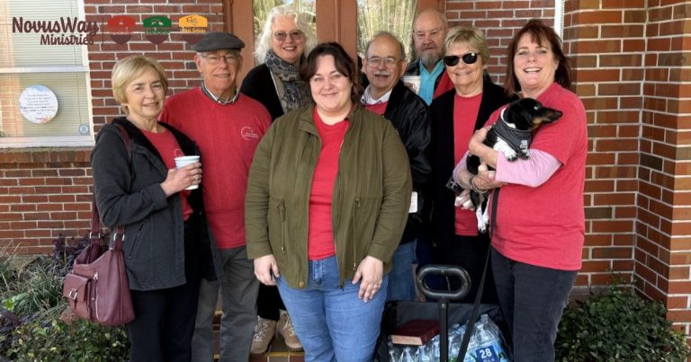 Members of St. Matthew’s Lutheran Church in Jacksonville gather outside their church, one holding a small dog