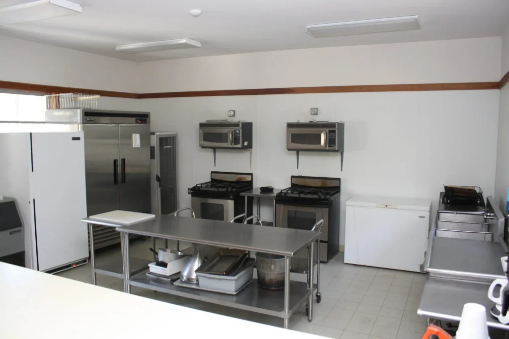 The Bischoff Center kitchen: stainless worktables, ranges and refrigerators