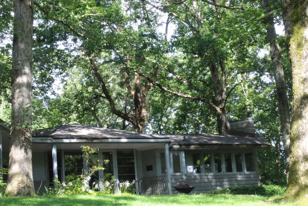 Mission Hall under tall oaks