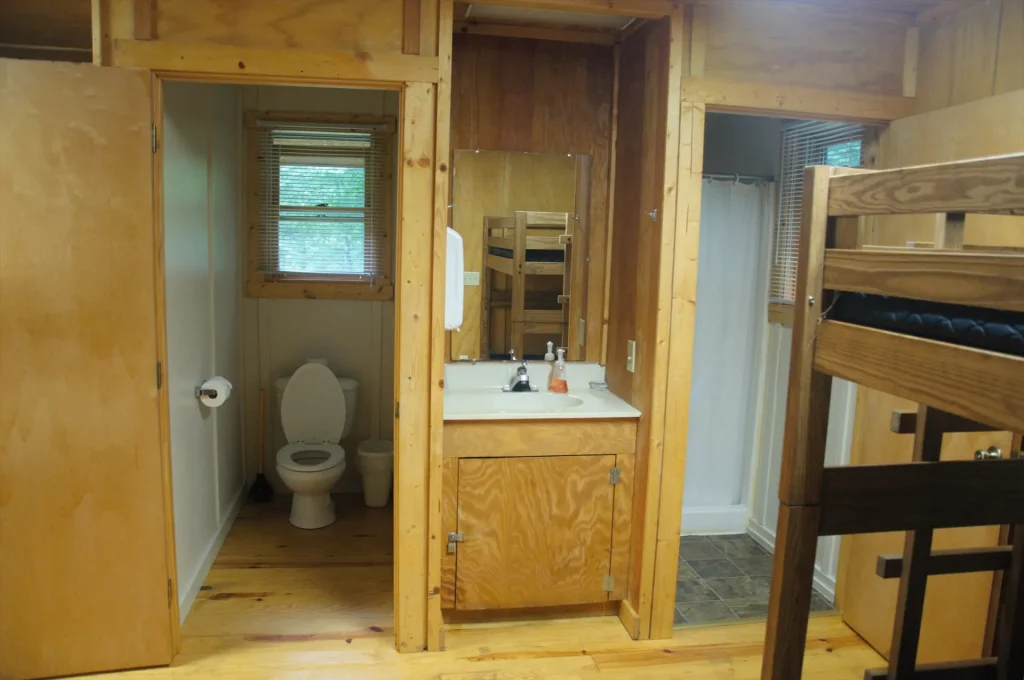 The bathroom and vanity off a Cabin Village bedroom