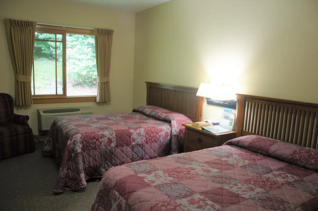 A Crow's Nest guest room with two beds