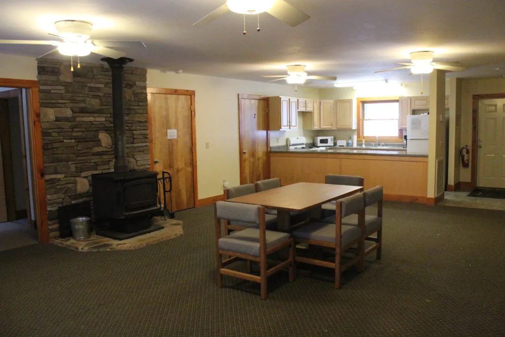 The Moretz Cabin living area, from the wood stove to the kitchen