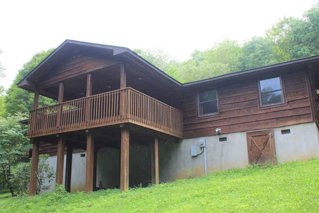 Moretz Cabin and its upper porch on the hillside