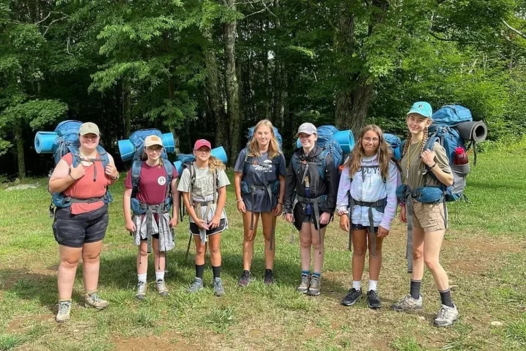 A Whitewater Backpack group of campers with their packs on, ready to set out from Lutherock