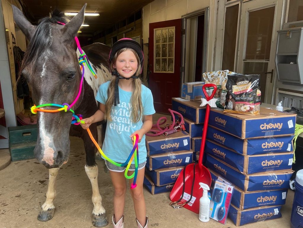 Charlotte dropping off presents